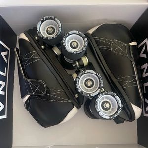 BRAND NEW VANILLA QUAD SKATES NEVER USED
